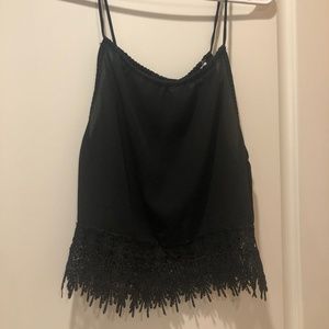 String at store black crop tank with lace design